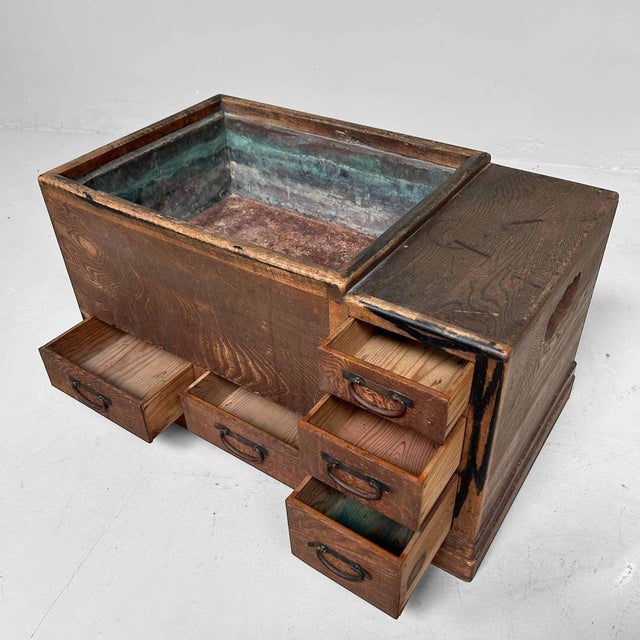 Beautiful wooden "nagahibachi" (長火鉢) with copper lining and five small drawers from the Meiji period (1868-1912)....