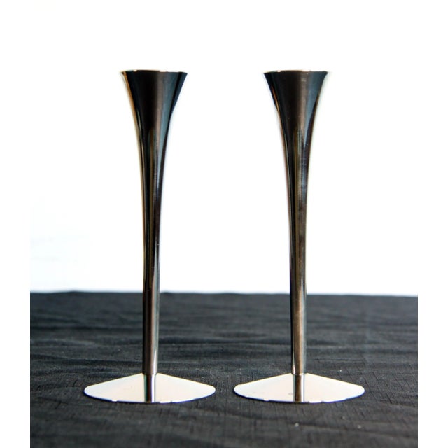 Stunning pair of vintage mid century modern chrome candlesticks by Solingen! Great styling as you can see, with a graceful...