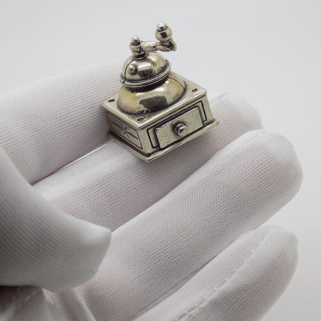 This charming miniature grinder was handmade in Italy during the 1970s/1980s. Crafted in Continental Silver (hallmarked...