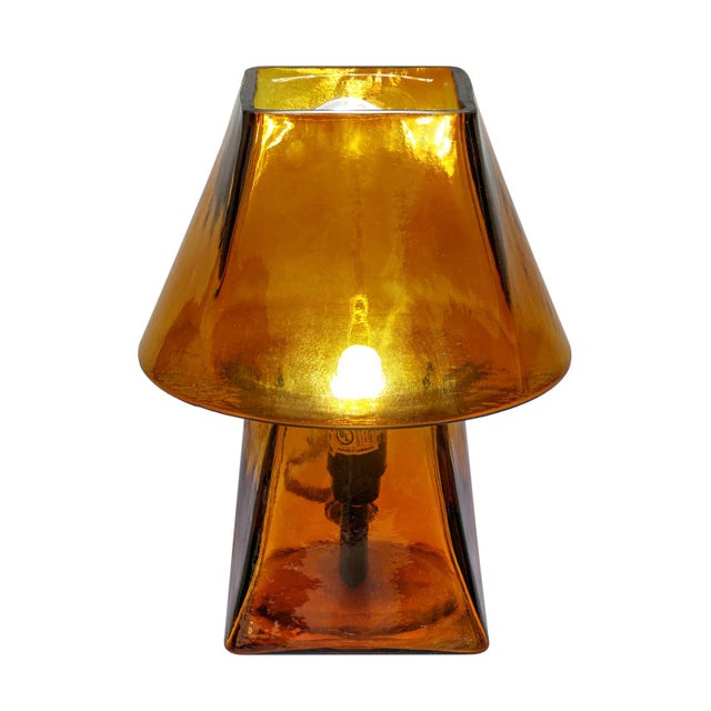 The Luca Glass Table Lamp turns everyday lighting into a little moment of magic. Crafted entirely from glass, it catches...