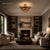 Illuminate your home with timeless elegance using this handcrafted flush mount ceiling light. Designed with a beautifully...