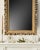 A 19th century Florentine style wall mirror with an ornate gilt frame. We commissioned this mirror for our store in the...