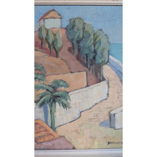 Mediterranean coast with palms and a hillside house. Oil on canvas, signed and dated 1963. Silver leaf frame. Brita...