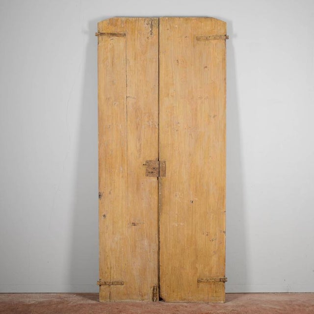 This splendid antique double door, dating back to the late 18th century, is a superb example of high-quality rustic...
