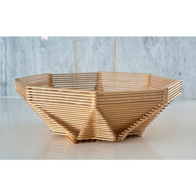 Bring an authentic layer of vintage charm and striking geometry to your space with this mid-century modern style tramp art...
