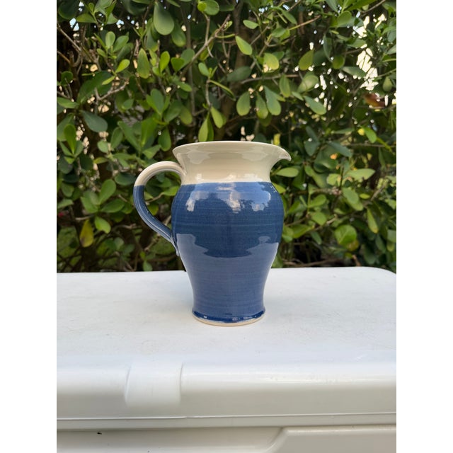 Handcrafted stoneware pitcher by Forrester Bandon Pottery of County Cork, Ireland. This hand-thrown example features a...