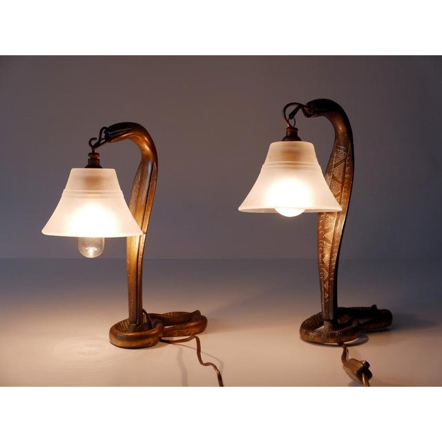 Set of two rare and highly decorative art nouveau bronze cobra table lamps. Made around 1910s / 1920s in france. executed...