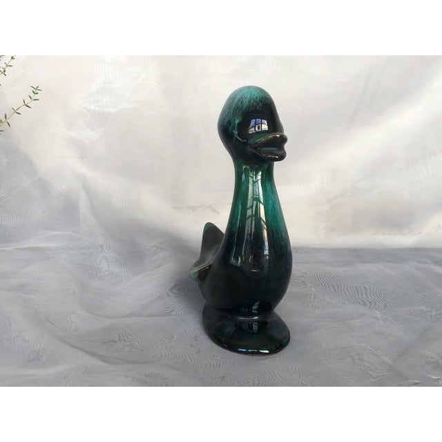 This stylized ceramic duck figurine will add a classic Mid-Century Modern decor accent to your home. Display the small...