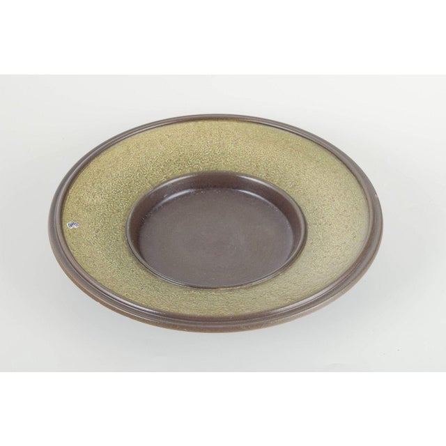 Mari Simmulson for Upsala-Ekeby Large bowl, 1960s. Wheel-thrown stoneware bowl with an organic form and richly textured...
