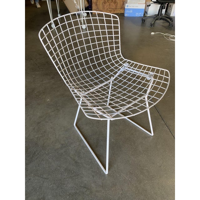 The Bertoia Side Chair is a timeless icon of mid-century modern design, originally created by Italian-born sculptor and...
