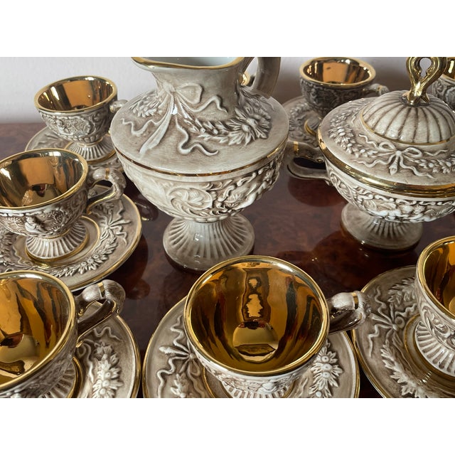 The R. Capodimonte coffee service is an elegant testimony to ceramic art, characterized by charming and refined details....