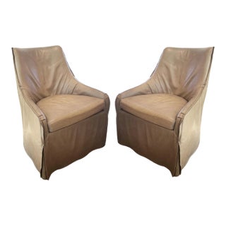 Pair of Taupe Leather, Skirted Slip-Covered Verellen Chairs on Casters For Sale