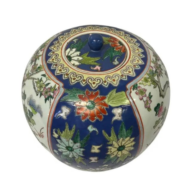 Vintage Chinese Porcelain Ginger Jar with matching Lid. Jar is beautifully hand-painted with an abundant scene of colorful...