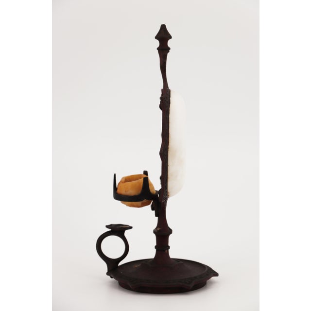 Circa: 19th Century. Origin: France. Note: Marked, but not identified. Material: Cast iron and porcelain reflector. Item...