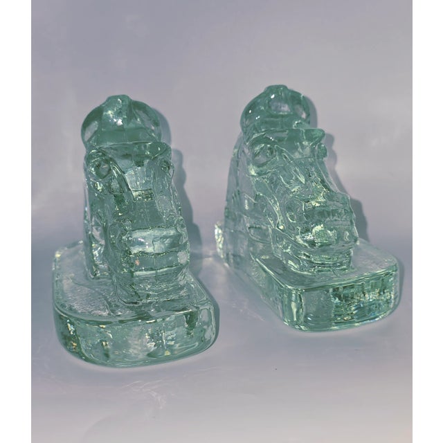 These Mid-Century Modern, solid glass, horse head book holders, were/are very popular decorations. They were often used to...