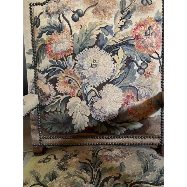 Louis XV style French chair from the late 19th century. Cabriole shaped legs support a hand carved frame covered in a...