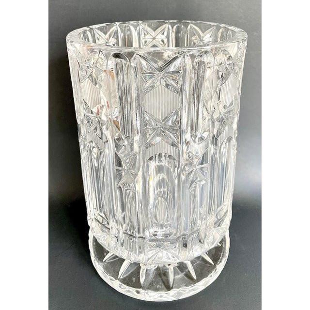 Here is a spectacular ice bucket made of thick crystal with a beautiful raised base. I love the sophisticated look and...