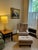 Vintage Wingback Lounge Chair and Custom Ottoman Reupholstered in Pollack Fabric For Sale - Image 11 of 11