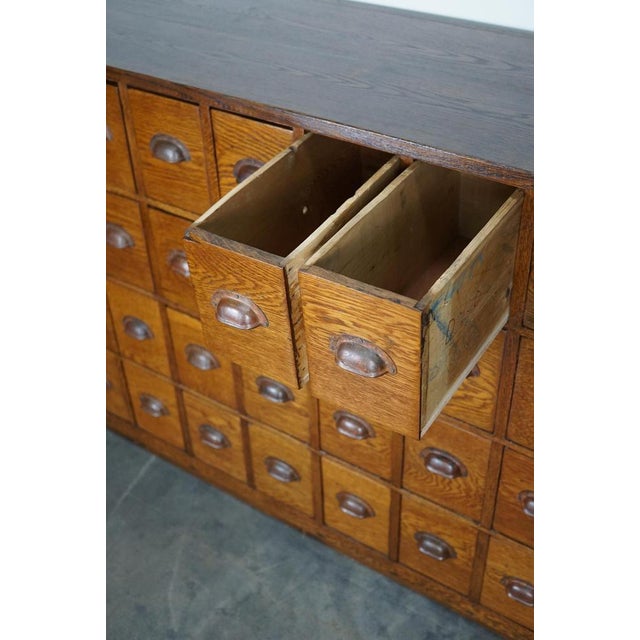 Dutch Industrial Oak Apothecary Cabinet Bank of Drawers, 1940s For Sale - Image 12 of 18