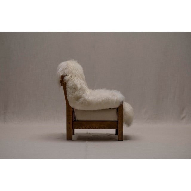 One of a kind brutalist ‘Yeti’ easy chair. This stunning piece made out of solid oak has been freshly re-upholstered in...