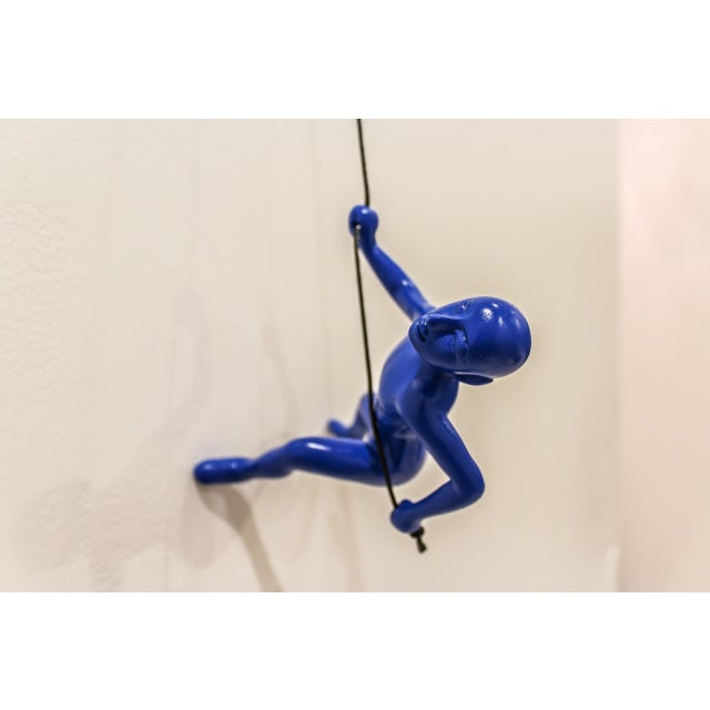 Modern Blue Position Climbing Man Durable Polyresin 3d Hanging Wall Art Sculpture with Leathered Rope and Hanging Hardware For Sale - Image 3 of 3