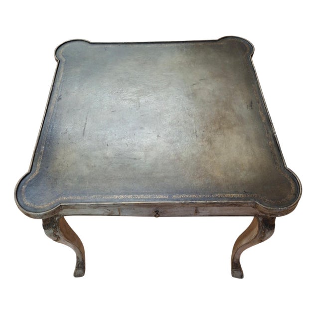 Early 20th century carved French games table with leather top, circa 1920 Beautiful games table with a leather top, four...