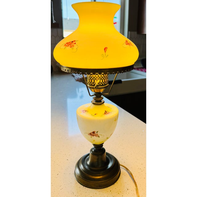 This item is an electric "Gone with the Wind" style hurricane lamp or parlor lamp. It features a classic Victorian design...