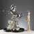 Clock set in a silver-plated resin sculpture depicting a prancing horse. Manufacturer's mark engraved on the base....