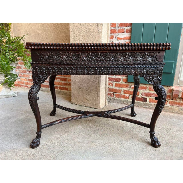 Antique Foyer Hall Table British Colonial Carved Wood Leather Flip Top Burmese. Direct from Europe, a stunning antique...