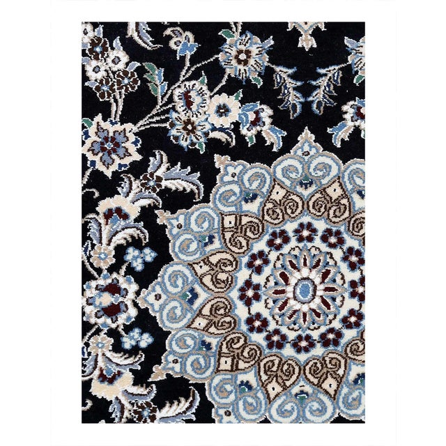 Beautiful hand-knotted Nain rug made from wool and silk. Nain is a small village located in central Persia that has...
