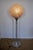 Superb space age lamp dating from the 1970s designed and produced in Italy. The large sphere is entirely composed of two-...