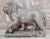 A lovely Medici Lion Garden Statue. This lion is majestically posed with a front foot resting on a ball and mounted on a...