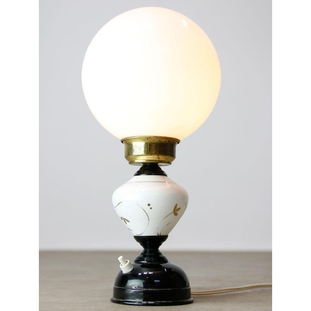 The lamp socket is designed for standard E27 light-bulb (not included) but also takes your standard E26 size (tested)....