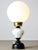 The lamp socket is designed for standard E27 light-bulb (not included) but also takes your standard E26 size (tested)....