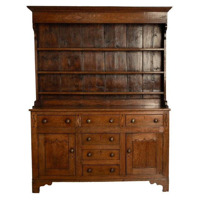 A very fine antique English George III period oak Welsh dresser with plate rack, circa 1780. This very handsome oak...