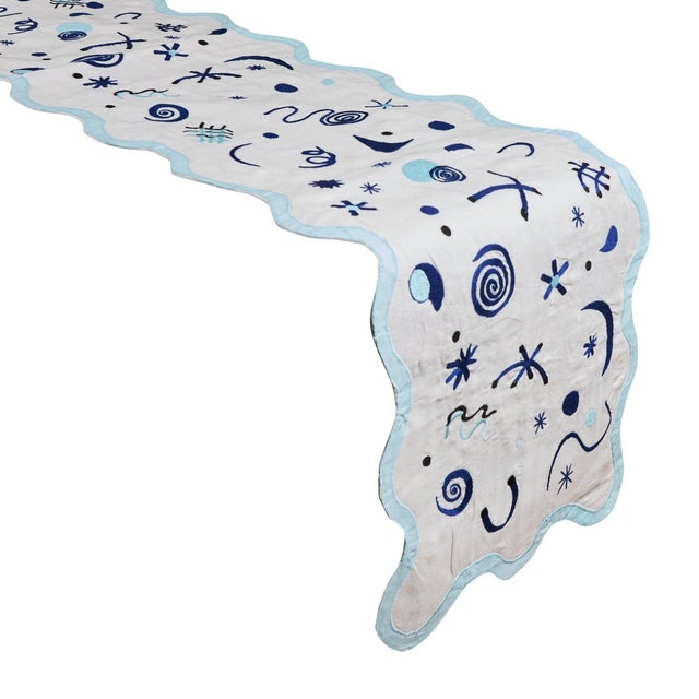 Turn your table into your canvas by draping one of our 85-inch-long embroidered runners over it. Made from durable,...