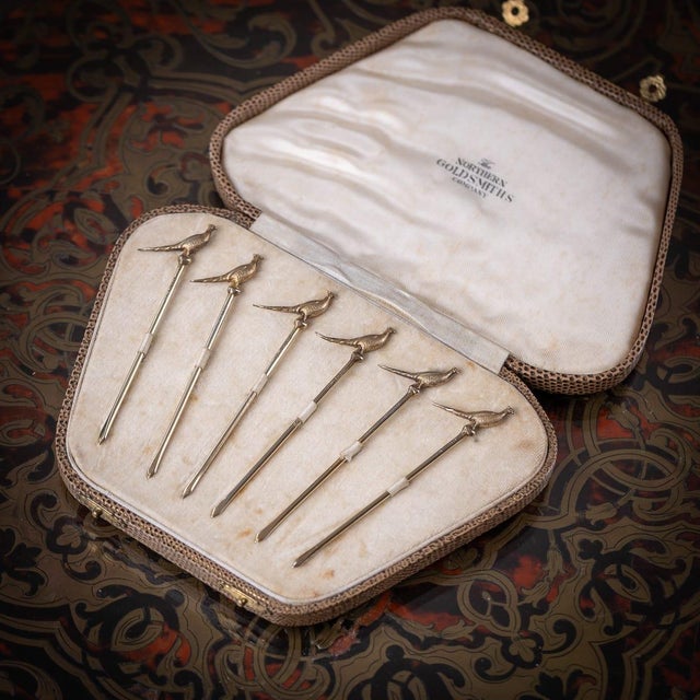 Vintage 20th Century English solid silver set of six cocktail picks in the shape of a pheasant. These cocktail picks are a...