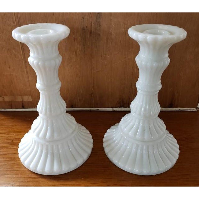 This is a Pair of 1950s Imperial Milk Glass Candle Holders Belknap Collection Atterbury White Glass. Each measures 7 1/2"...