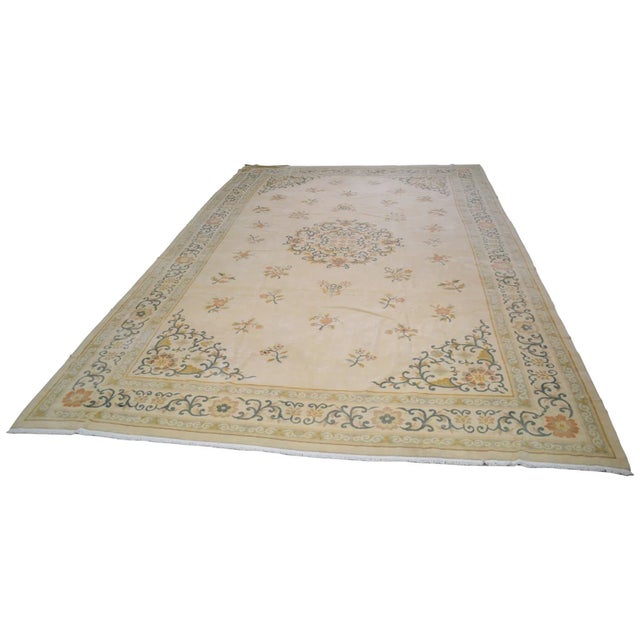 Hand-knotted with care using traditional rug-making techniques, this wool rug blends timeless craftsmanship with a modern...