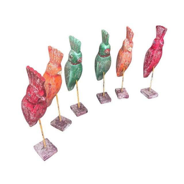 Add a playful, global touch to your interior with this vibrant set of six vintage hand-carved wooden parrots. Originating...