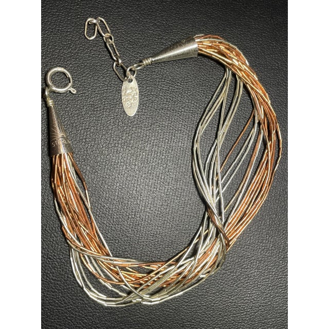 Navajo Native American ‘Running Bear’ bracelet, Multi strand liquid silver with very vibrant pristine polished sterling...