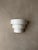 Minimalist Scandinavian wall lamp from the 1970s, crafted from white lacquered metal. The lamp features a stepped design...