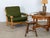 Pair of Danish lounge chairs in solid oak, designed by Henning Kjærnulf, 1960s. Each chair has loose seat and back...
