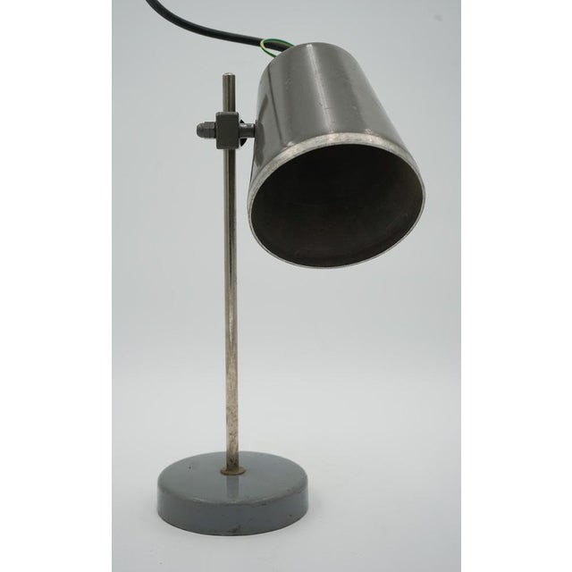 1940s English Salvaged Laboratory School Lamp Is A Remarkable Piece. This lamp showcases the charm and industrial design...