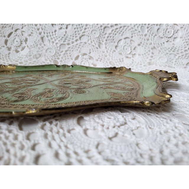 A vintage Italian Florentine green and gold gilt rectangular tray, made in Italy. This beauty can be used as a decorative...