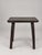 In the style of the artisans of Marolles and the Loir-et-Cher region, a blackened wood table with a honeycomb pattern...