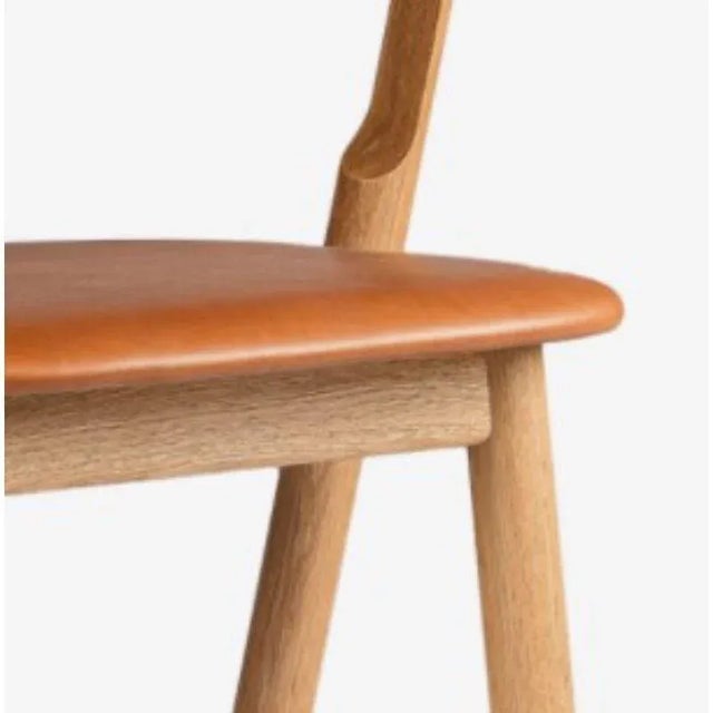 Nude dining chair, natural leather by Made By Choice (Upholstery Category 1) Nude Collection with Harri Koskinen...