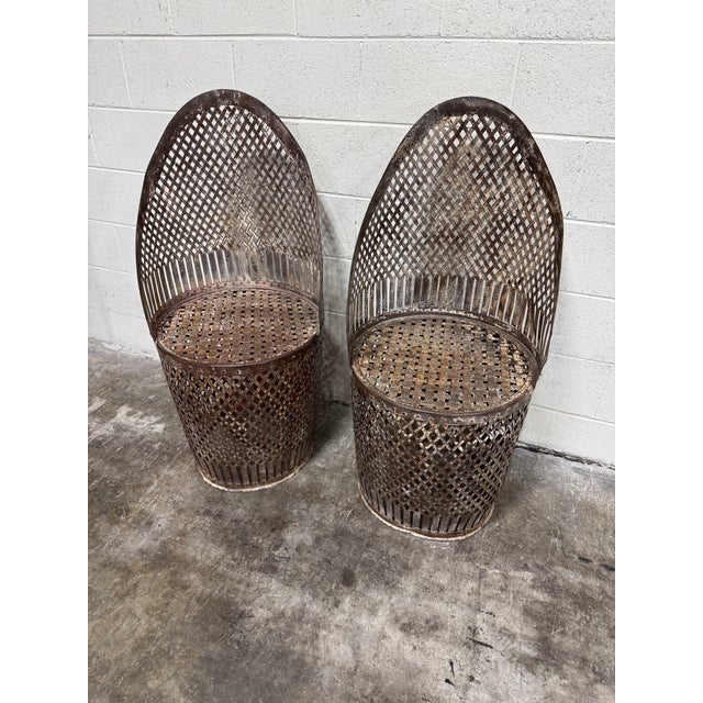 Very cool metal lattice woven garden seats in a rustic painted chippy finish. Great condition and surprisingly comfy and...