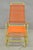 Vintage Mid Century Modern Orange Vinyl Spaghetti Strap Metal Tubular Frame Glider Lounge Chair by Maxxin Co, Los Angeles....