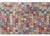 This late 20th-century Tibetan hand-knotted wool runner is a stunning celebration of vibrant color and intricate design....